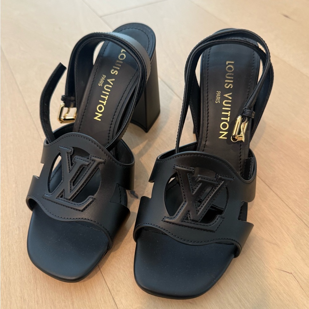 Like new - LV Isola - Louis Vuitton Black Women's Sandals with Gold Accents